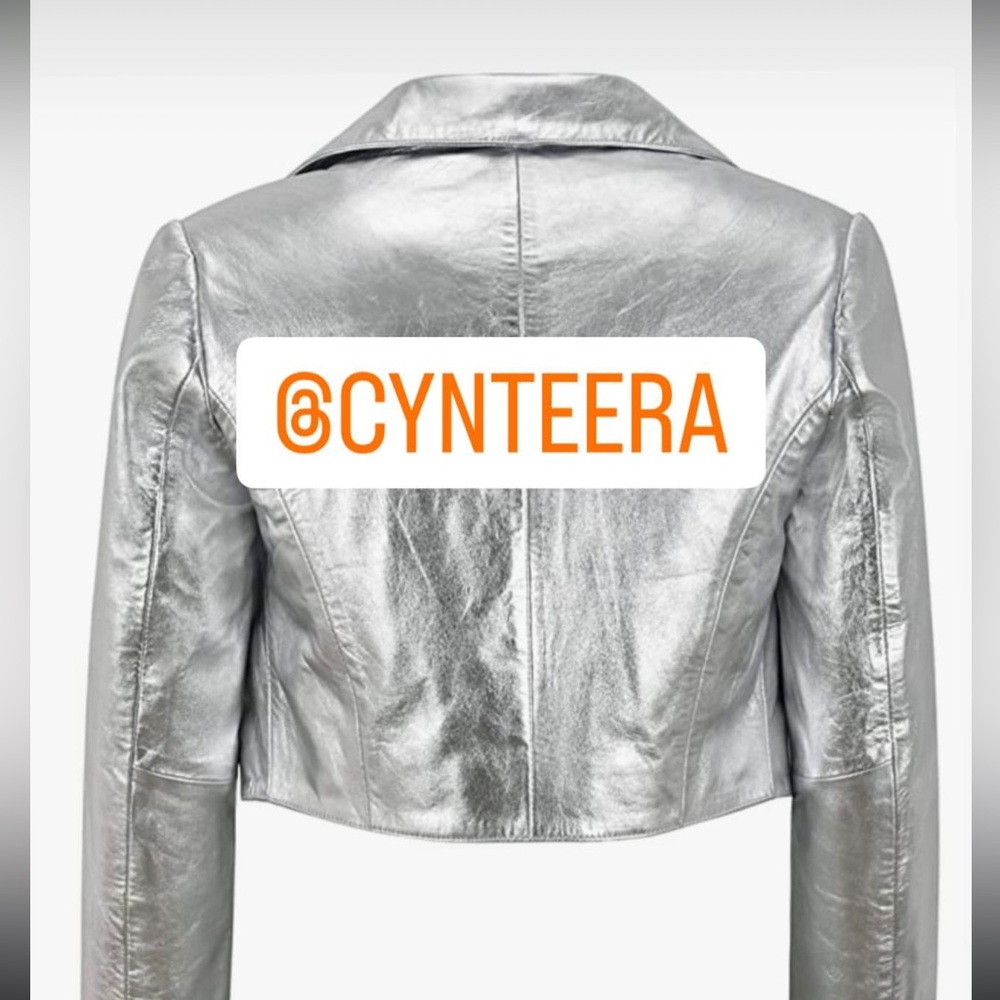 Stunningg silver 100% leather bolero jacket. Great for holidays.